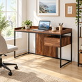 Brown and black computer desk in a bright home office