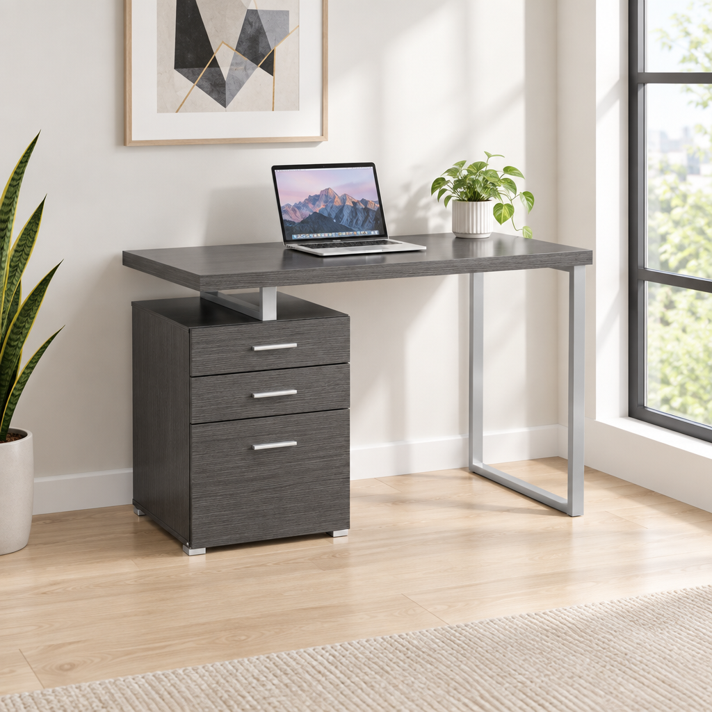 47-inch gray and silver computer desk with 3 drawers in a bright home office