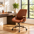 Cognac brown top-grain leather executive office chair in a sunny home office