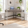 42-inch taupe and silver corner computer desk in a bright home office