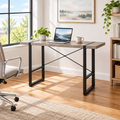 Taupe and black computer desk in a bright home office