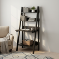Espresso ladder desk styled in a cozy reading nook