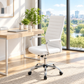 White ribbed faux leather conference chair with chrome base in a sunny office