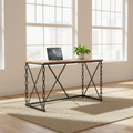 Brown and black industrial computer desk in a bright loft office