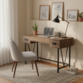 Brown and black computer desk with 2 drawers in a cozy home office