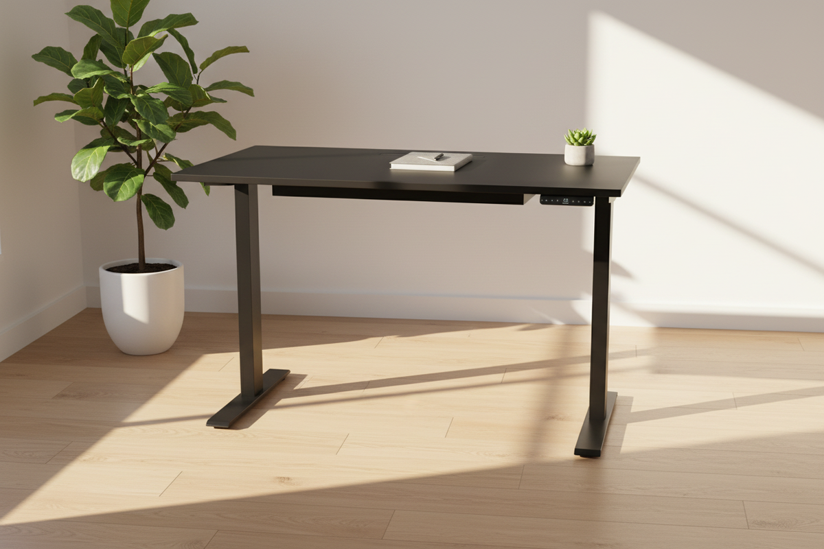 48 inch all-black adjustable computer desk in a sunlit home office corner