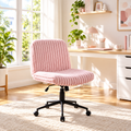 Pink ribbed faux fur gaming chair with black base in a sunny home office