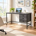 Gray and black computer desk with 3 drawers in a bright home office