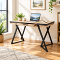 Brown and black writing desk with drawer in a bright home office