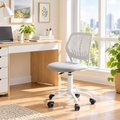 Light gray compact office chair with white base in a sunny home office