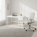 White executive desk in a bright home office