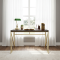 Espresso and gold writing desk in front of a sunny window